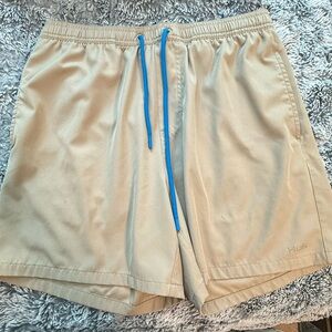 Huk Men's Tan Athletic Shorts with Blue Drawstring
